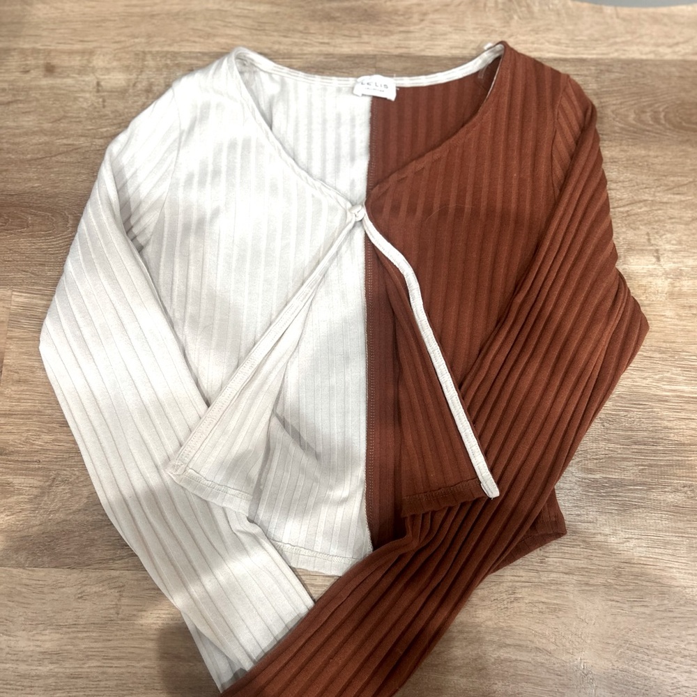 Muti colored Sweater that buttons in the middle